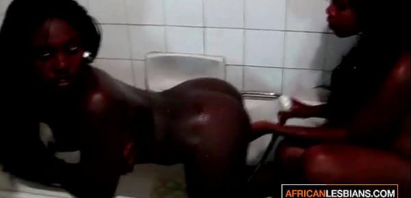  Amateur African Lesbian Couple Fingering and Licking each other in a Bath